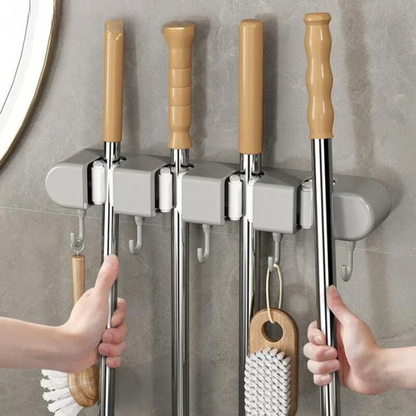 Versatile wall support for household tools 